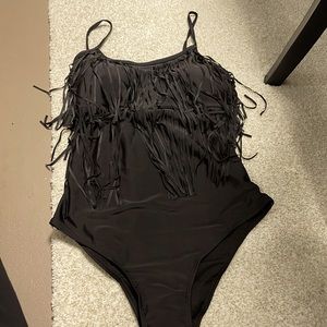 One piece black bathing suit with fringes